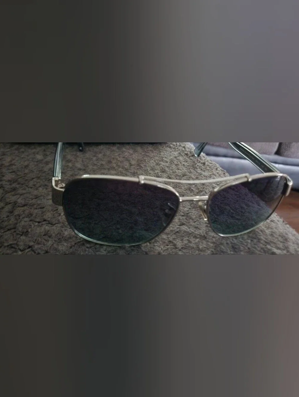 Womans Silver Aviator Coach Sunglasses with Dark Lenses
